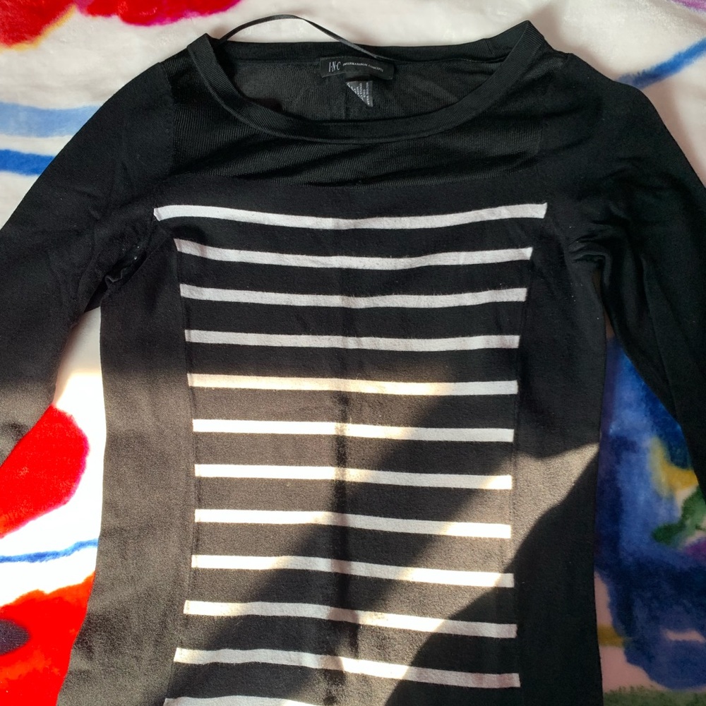 I’m selling this gently worn INC sweatshirt.